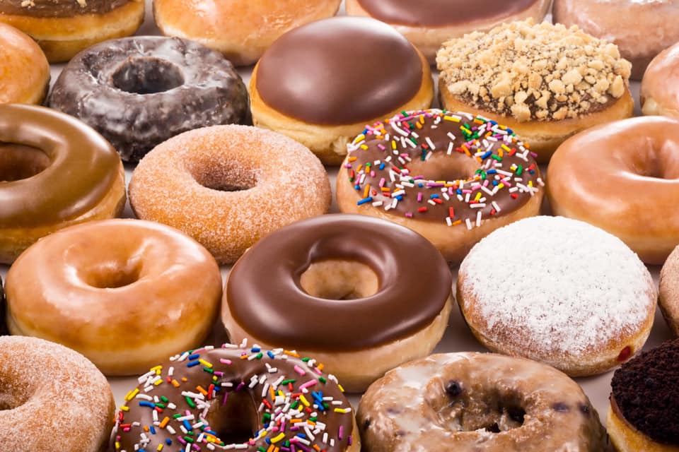 The charming and welcoming exterior of Sunrise Donuts.